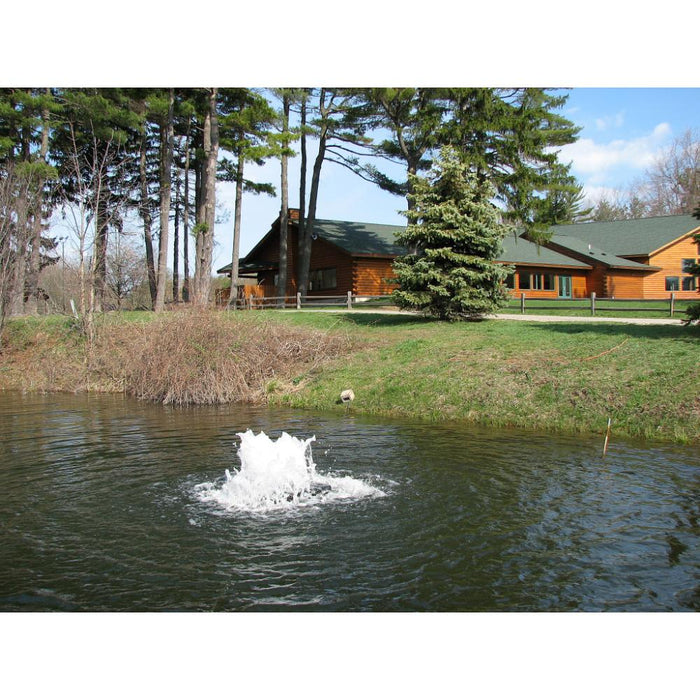 Scott_Aerator_Boilermaker_Surface_Aerator_in_water_with_cabin_in_background