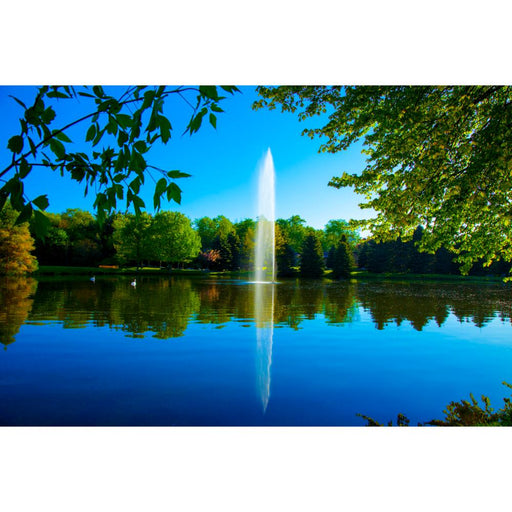 Scott_Aerator_Gusher_Pond_Fountain_in_lake_with_trees_in_background