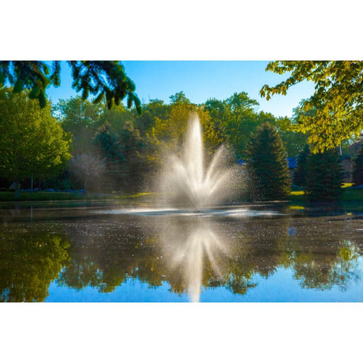 Scott-Aerator-Cambridge-Pond-Fountain-in-pond-with-trees-in-background