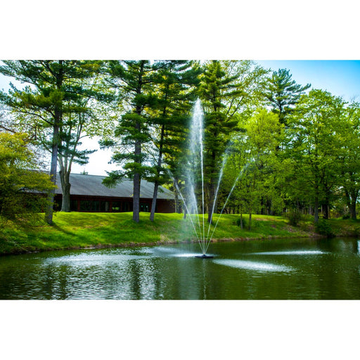 Scott-Aerator-Clover-Pond-Fountain-in-pond-with-trees-and-building-in-background