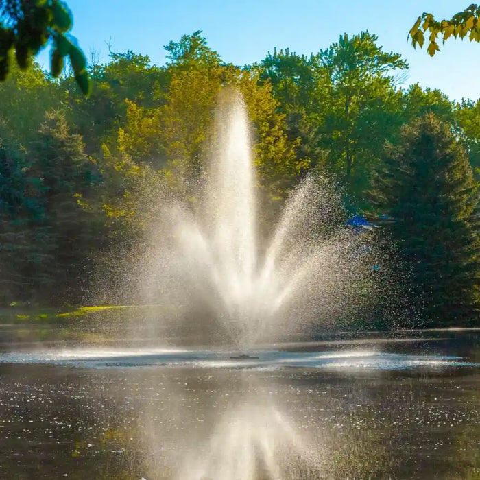 scott_aerator_cambridge_pond_fountain_on_water_with_trees_in_background