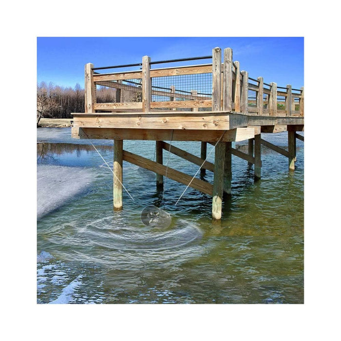 scott-aerator-slinging-de-icer-attached-to-dock-in-water